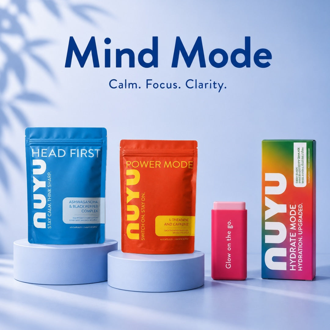 NUYU Mind Mode kit on blue plinths: Head First pouch, Power Mode pouch, pink pill case and Hydrate Mode box