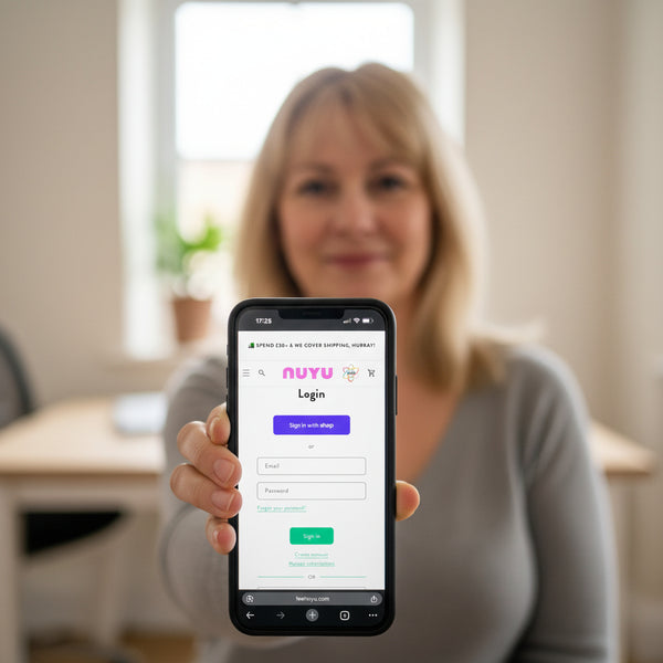 NUYU wellness app login screen displayed on mobile phone for UK supplements