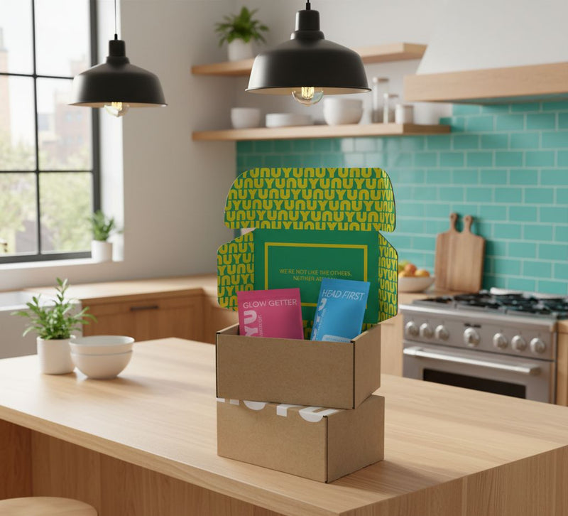 NUYU subscription box on kitchen counter with wellness supplements UK delivery