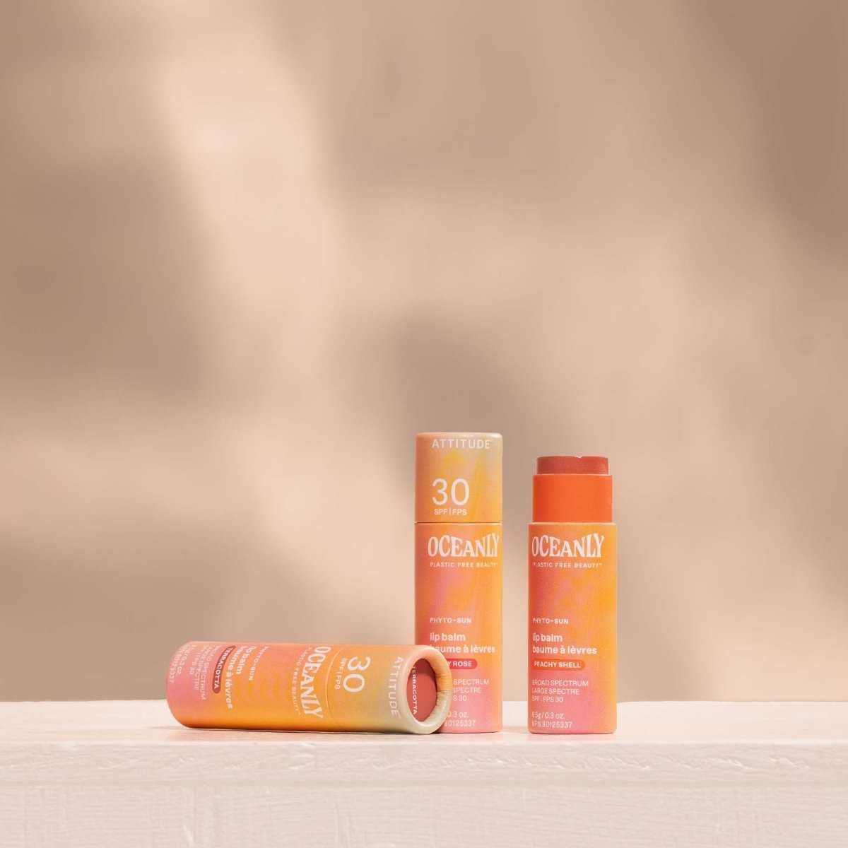 NUYU orange terracotta lip balm SPF 30 tubes arranged on neutral background wellness supplement UK