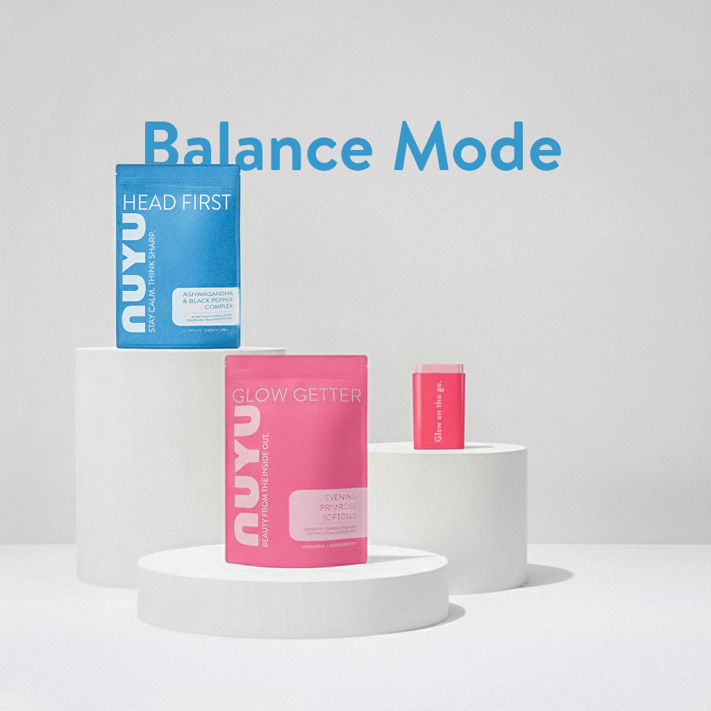 NUYU Balance Mode wellness supplement UK kit with blue Head First and pink Glow Getter boxes on white platforms