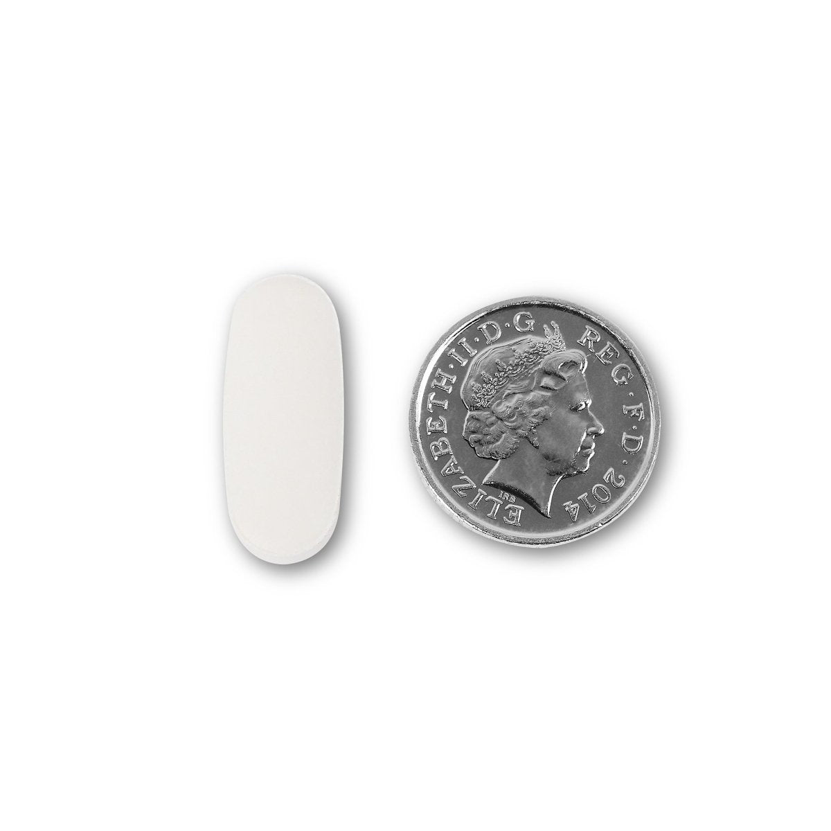 NUYU calcium tablet shown next to UK coin for size comparison of daily vitamins