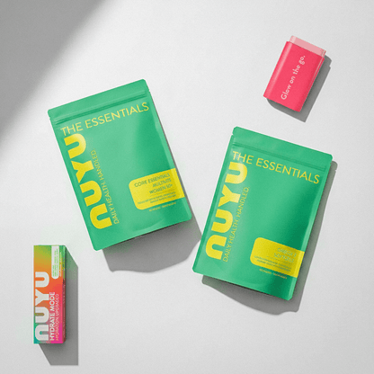 NUYU everyday magnesium spray UK essentials kit with green packaging on white background