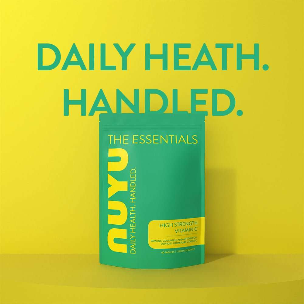 NUYU high strength vitamin C supplement in green packaging on yellow background multivitamin UK