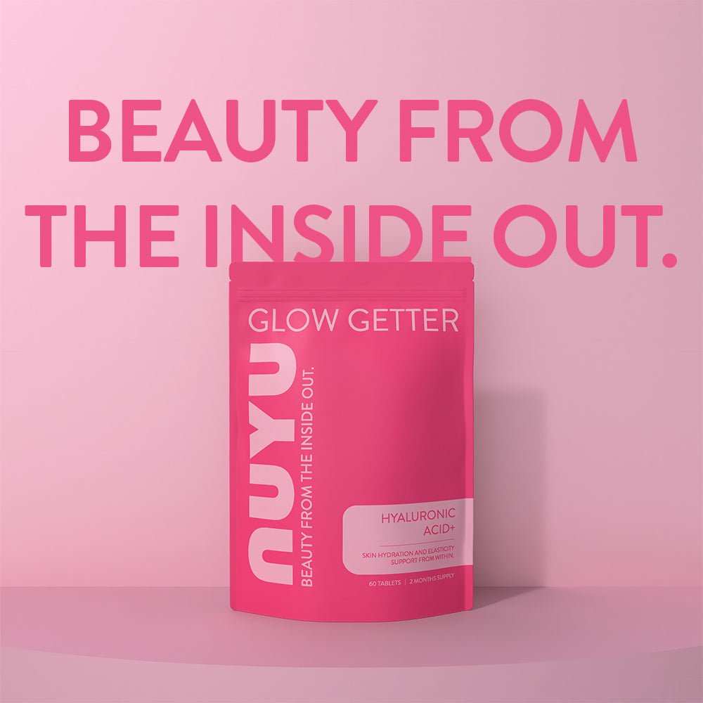 NUYU Hyaluronic Acid+ wellness supplement UK in pink packaging on gradient background