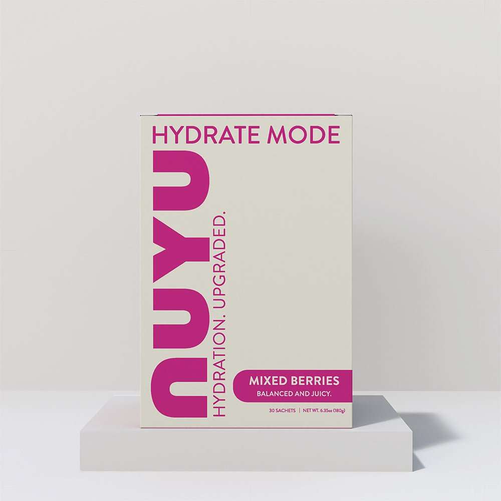 Nuyu Hydrate Mode Mixed Berry electrolyte drink mix with Vitamin C, magnesium, zinc, zero sugar, and berry flavor in single-serve sachets