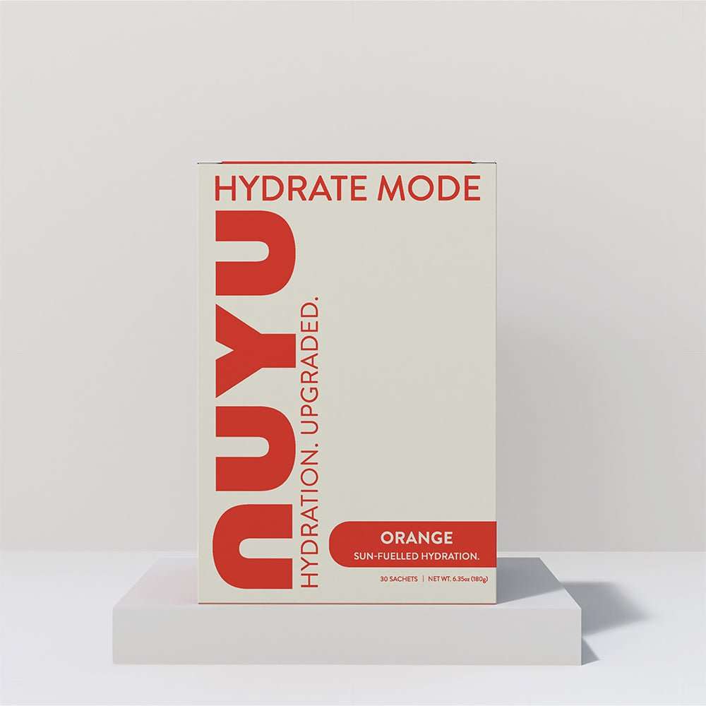 NuYu Hydrate Mode Orange electrolyte drink mix with airborne Vitamin C, magnesium, zinc, zero sugar, and refreshing orange flavor in single-serve sachets for hydration and immune support.