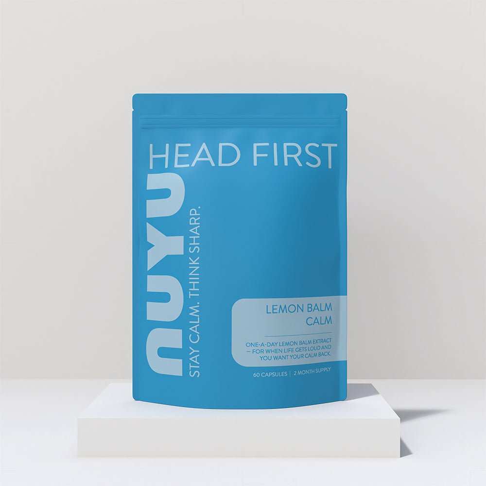 NUYU Lemon Balm Calm supplement pouch in blue packaging on white surface, magnesium sleep spray UK brand