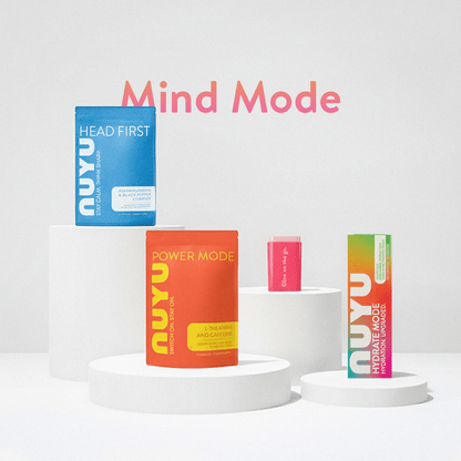 NUYU Mind Mode wellness supplement UK kit with four colorful product boxes on white pedestals