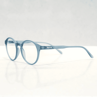 NUYU Afterlight blue light blocking glasses UK in translucent blue frame on white background