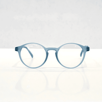 NUYU Afterlight blue light blocking glasses UK in translucent blue frame on white background