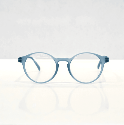 NUYU Afterlight blue light blocking glasses UK in translucent blue frame on white background