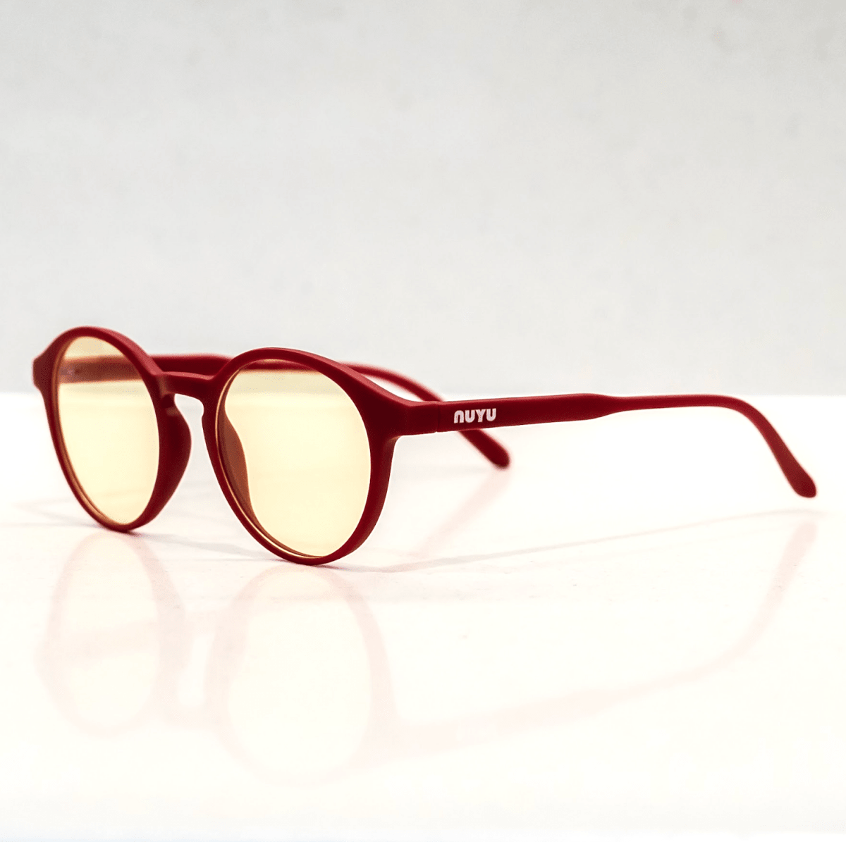 NUYU Afterlight blue light blocking glasses UK in burgundy red frame with yellow lenses