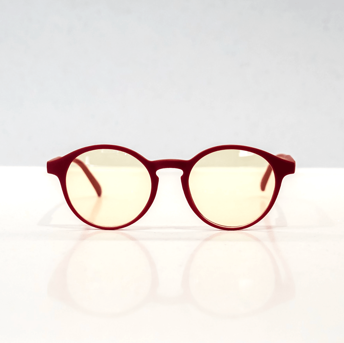 NUYU Afterlight blue light blocking glasses UK in burgundy red frame with yellow tinted lenses