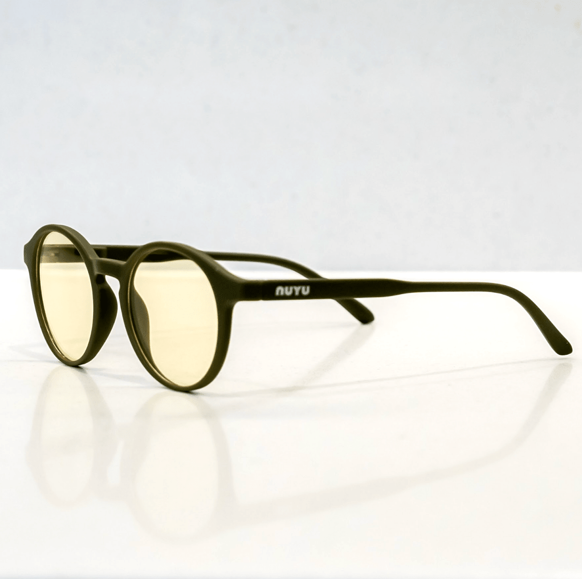 NUYU Afterlight blue light blocking glasses UK in olive green frame with yellow lenses