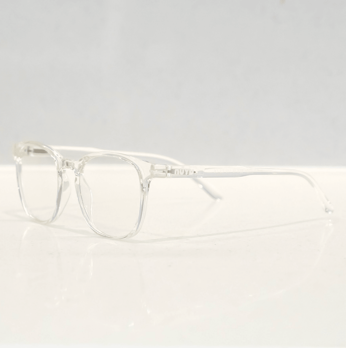 NUYU Afterlight blue light blocking glasses UK in clear transparent frame on white background