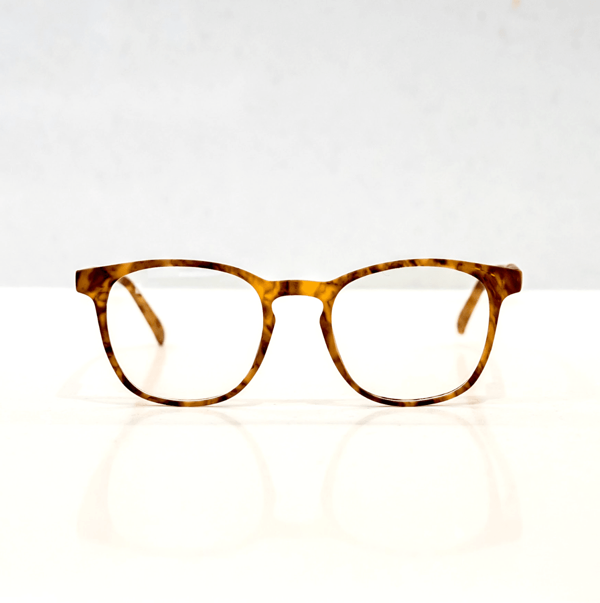 NUYU Afterlight blue light blocking glasses UK in tortoiseshell frame on white background