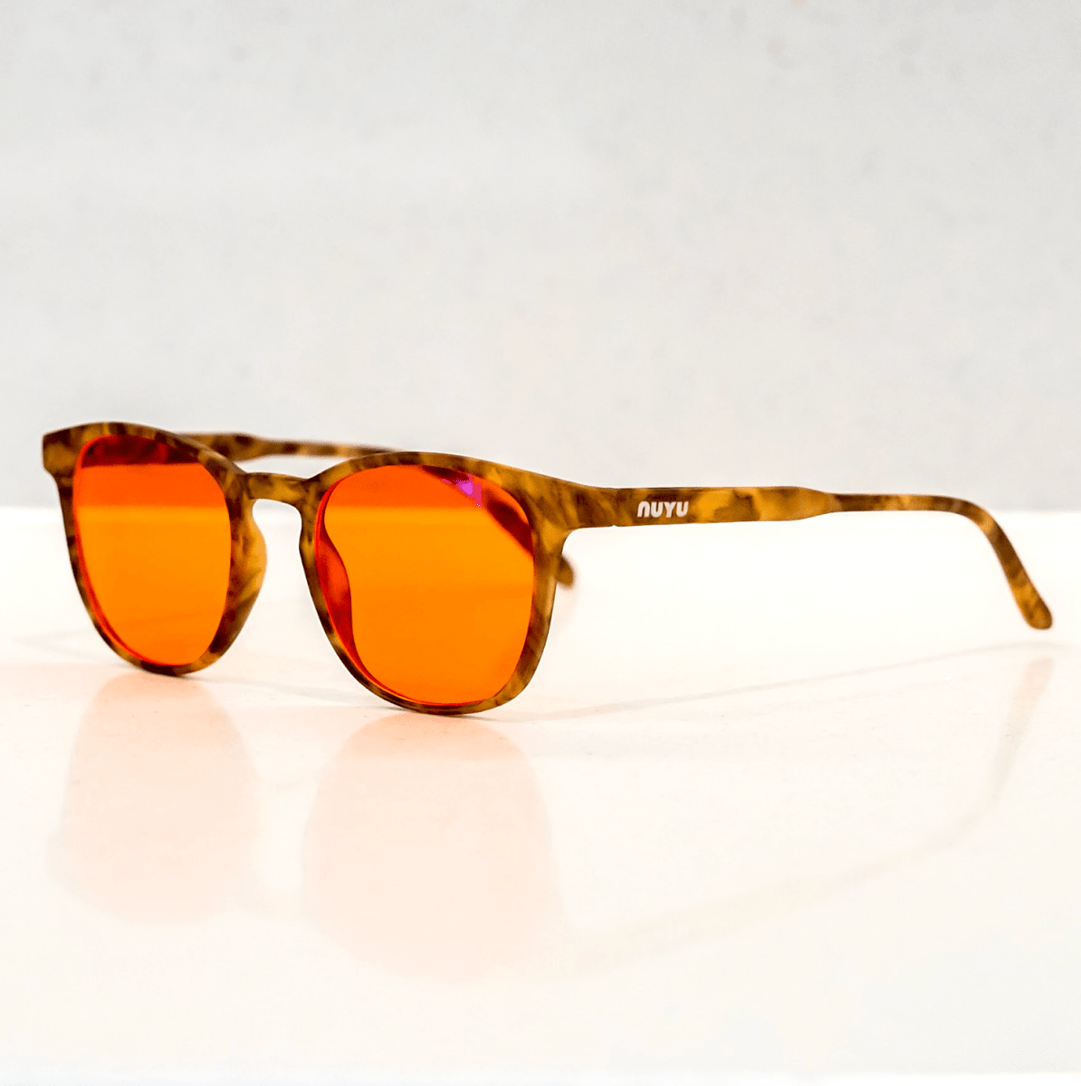 NUYU Afterlight blue light blocking glasses UK with orange lenses and tortoiseshell frames