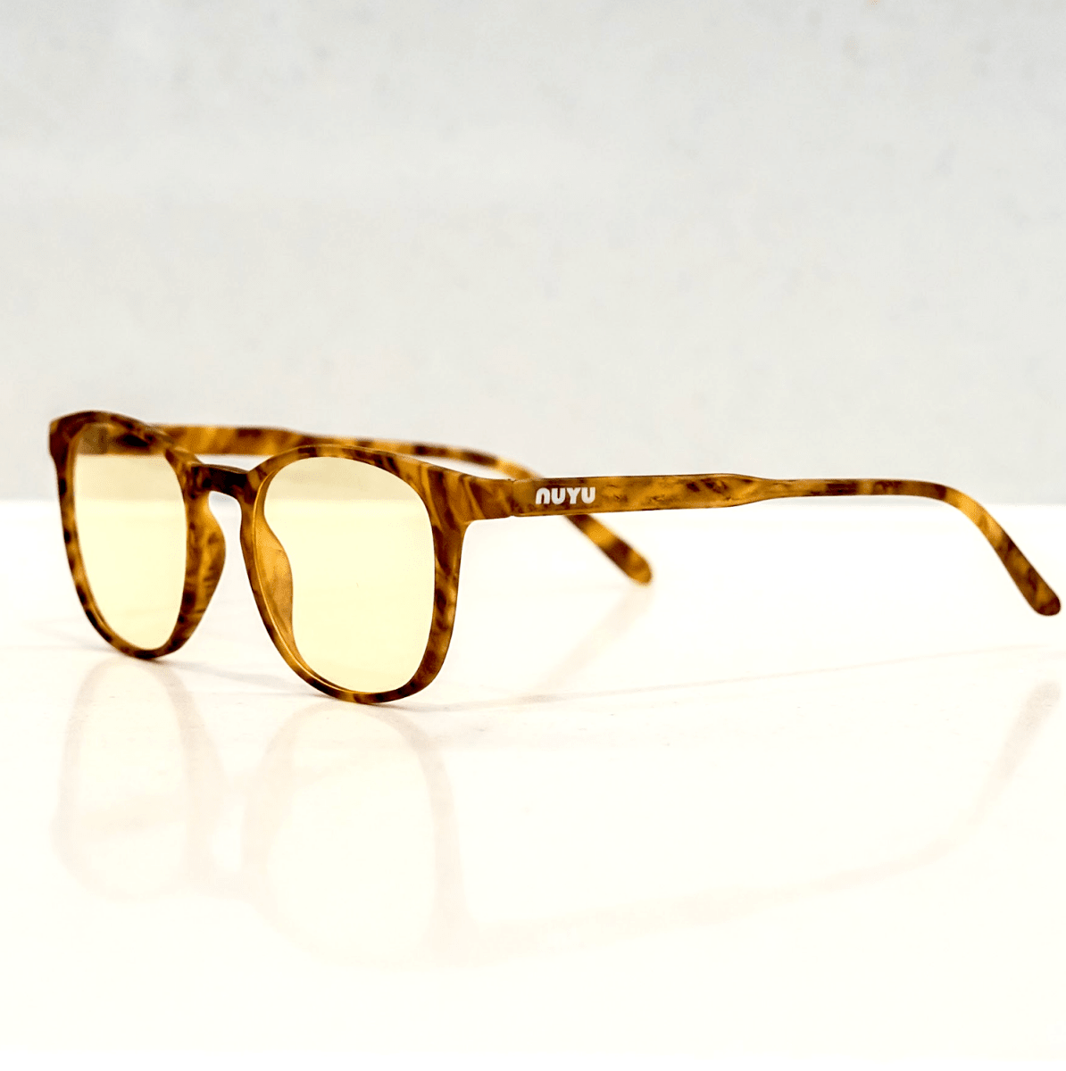 NUYU Afterlight blue light blocking glasses UK in tortoiseshell frame with yellow lenses