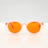 NUYU Afterlight blue light blocking glasses UK with pink frames and orange lenses front view