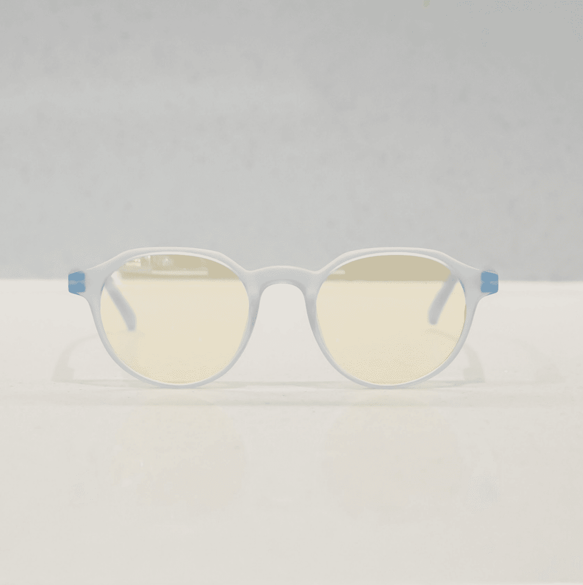 NUYU Afterlight blue light blocking glasses UK with clear frames and yellow-tinted lenses