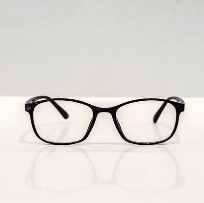 NUYU Afterlight blue light blocking glasses UK with black frames on white surface