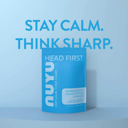 NUYU ashwagandha supplement UK in blue packaging against soft blue gradient background