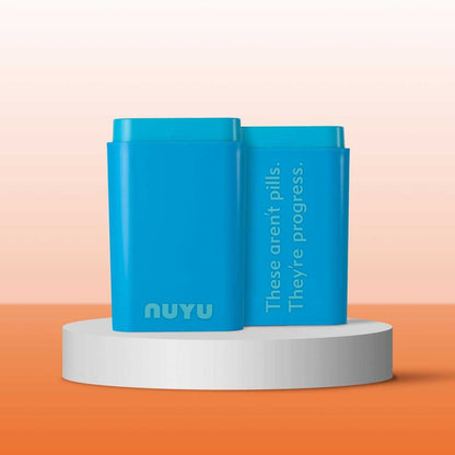 NUYU Pocket Pack blue wellness supplement UK containers displayed on white platform with orange backdrop