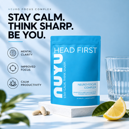 NUYU Neuro Focus Complex pouch on a white plinth with tablets, a glass of water and a lemon wedge