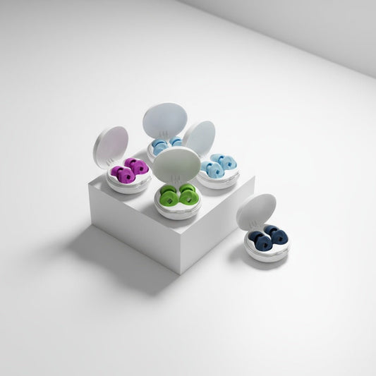 NUYU noise cancelling earbuds UK in colorful cases on white display platform