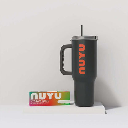 NUYU wellness supplement UK tumbler and colorful hydration bundle box on white surface