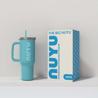 NUYU turquoise insulated tumbler UK with straw beside white and blue packaging box