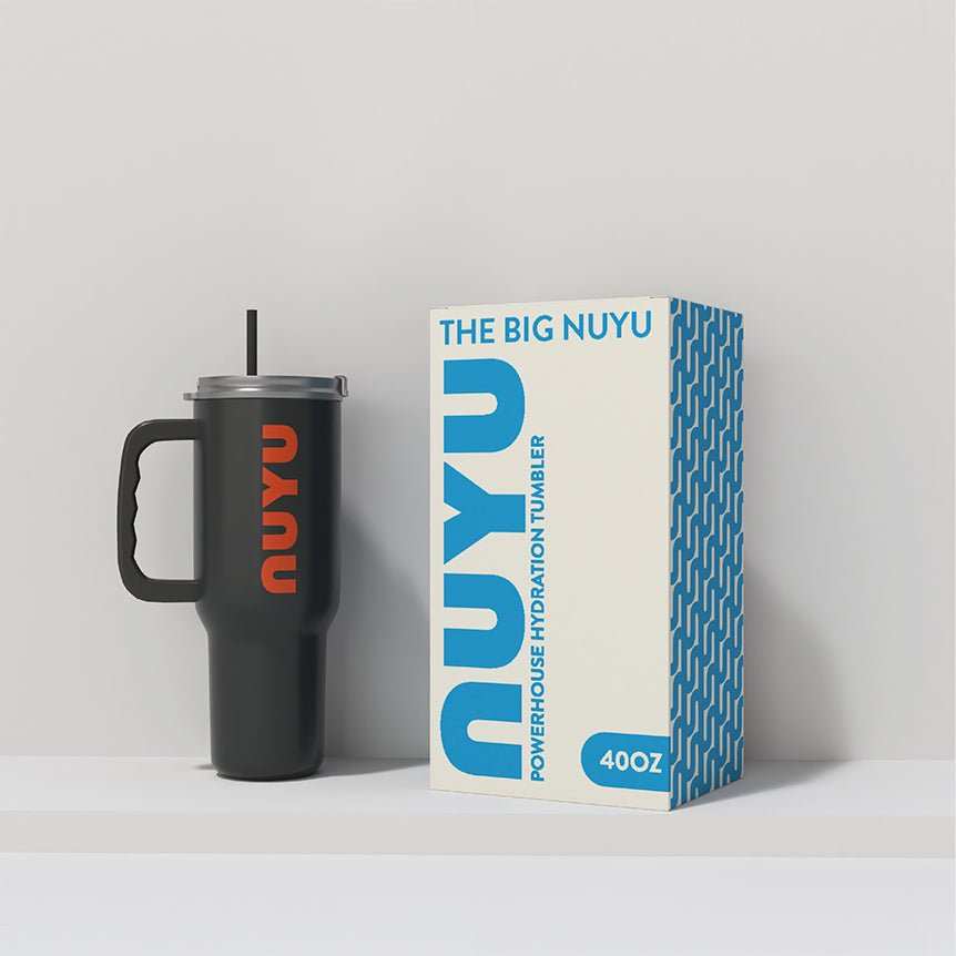 black stainless steel tumbler with handle and NUYU branding next to blue and white THE BIG NUYU packaging box 40oz capacity