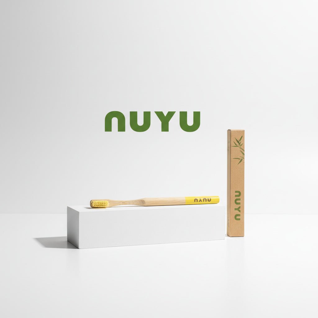 NUYU Happy Toothbrush with yellow bristles and kraft packaging, wellness supplement UK brand