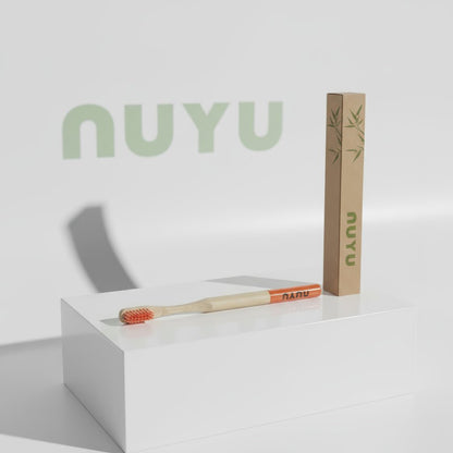 NUYU Happy Toothbrush with bamboo packaging on white display - wellness supplement UK brand