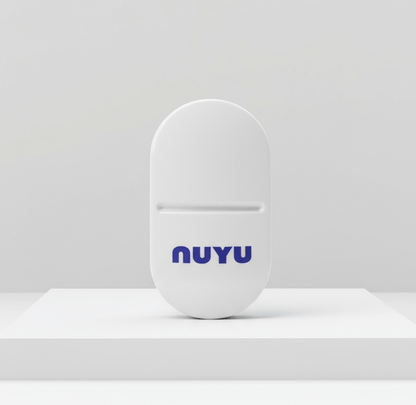 NUYU white oval pill cutter with blue logo on clean minimalist background - wellness supplement UK accessory